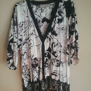 Ivory, black, & rose tunic with fringed bottom.